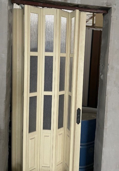 With transparent glass PVC folding door